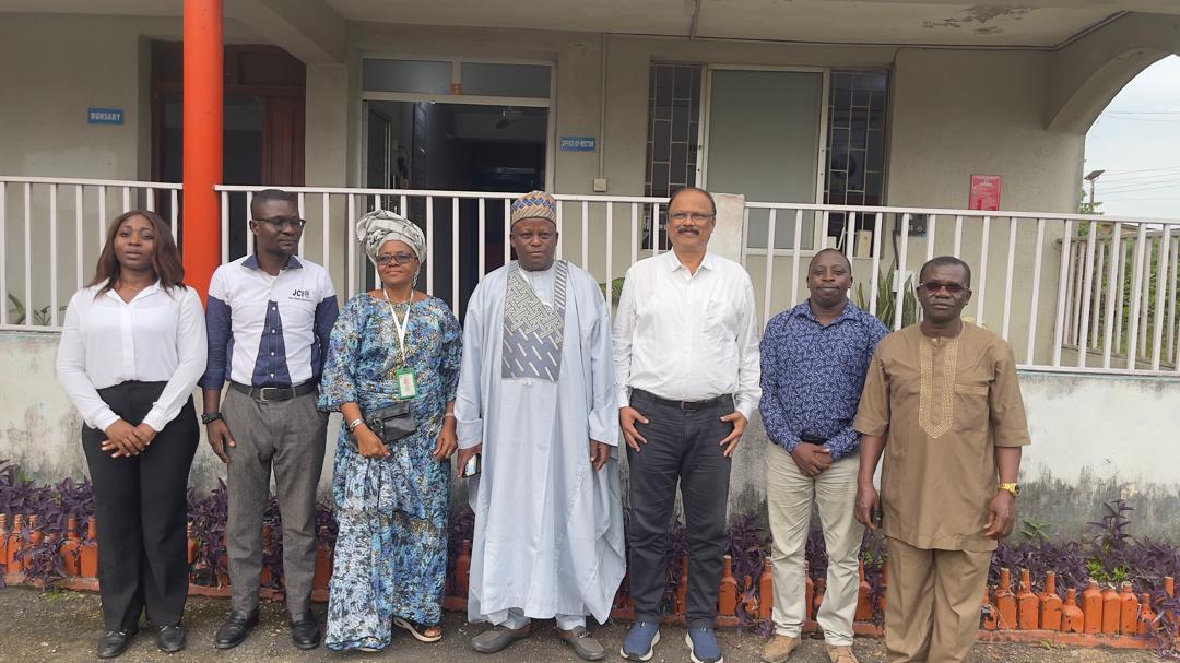 A closer group photograph of the seven attendees at Inspire Polytechnic’s Egbeda campus on 7 October 2026.